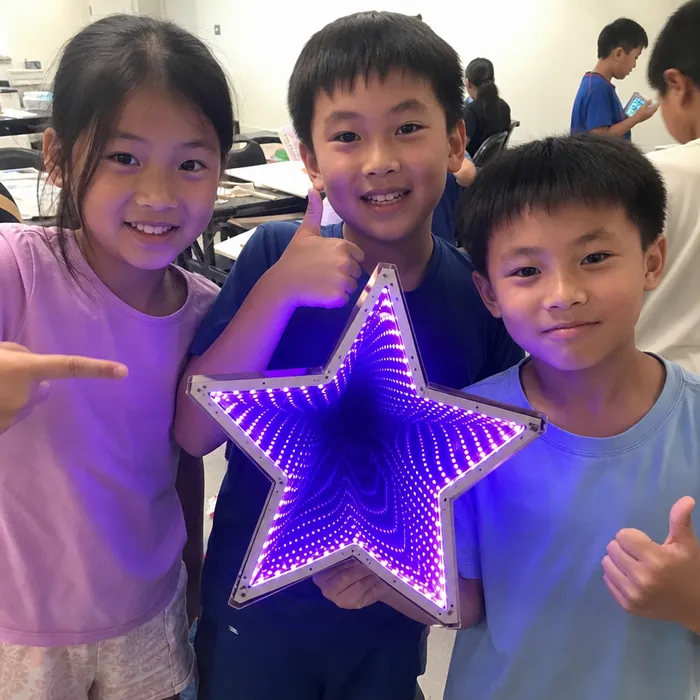 Children showing off their infinity mirror builds