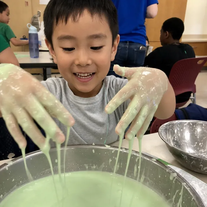 Children exploring oobleck